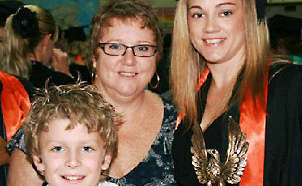 Bob Walker Memorial Award winner Shanea Rossiter with son Bailey and lecturer Alison Ahlhaus. Bob Walker Memorial Award winner Shanea Rossiter with son Bailey and lecturer Alison Ahlhaus.